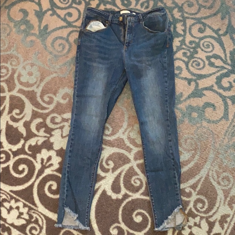 A loves a high rise jeans with fringe ankle